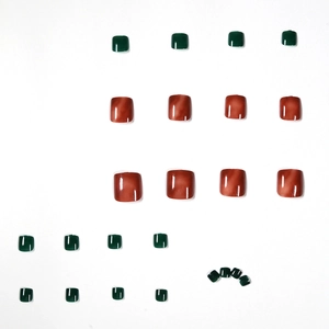 Deep green and amber marble press-on toe nails with glossy finish for summer style