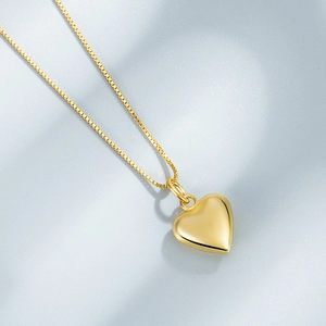 Elegant 925 sterling silver 18k gold heart pendant necklace on a refined box chain