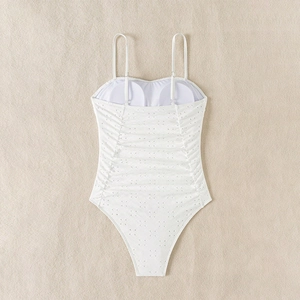Elegant white one-piece swimsuit with spaghetti straps and eyelet hollow texture