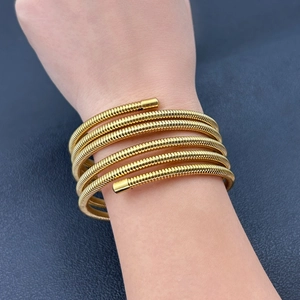 Modern gold multi-layer wrap spring bracelet with metal tubogas design for women