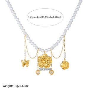 Vintage gold pearl necklace with floral and butterfly charms, length 33.5+9cm, weight 18g