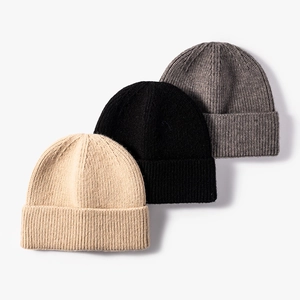 Set of ribbed knit beanies in beige, black, and grey for autumn and winter outdoor warmth