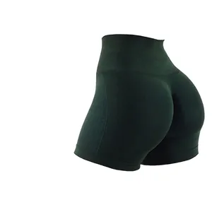 High waist seamless yoga shorts in dark green with body contouring and lifting effect