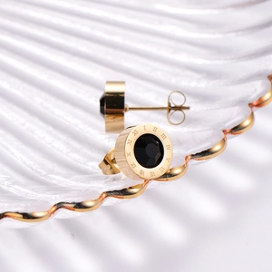 Classic gold titanium earrings with black gemstone and engraved Roman numerals