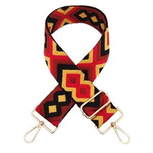 Close-up of 5cm wide geometric diamond jacquard strap with gold metal hooks and buckles