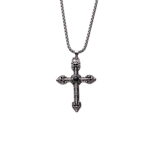 Retro titanium steel cross necklace with black stone pendant on white background