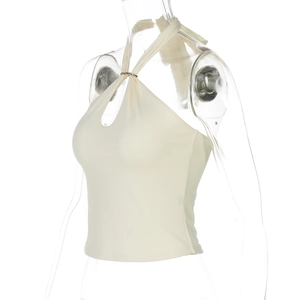 Detail of off-white halter top with gold metal buckle and high-elastic knit fabric