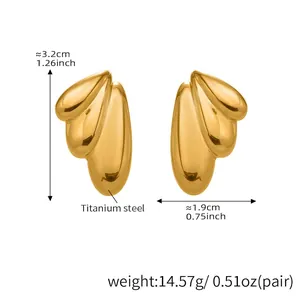 Detailed view of 18k gold plated angel wing earrings with dimensions and material specs