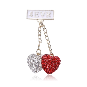 Dual heart brooch featuring white and red crystal pendants with 4EVR gold letter plaque