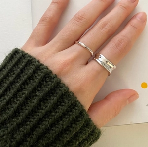 Minimalist 925 sterling silver irregular ring set featuring smooth and twisted band textures