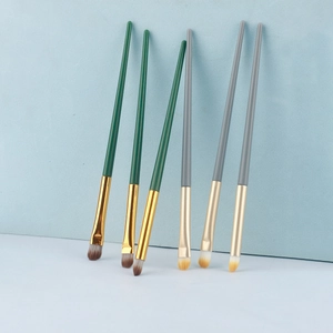 Set of 6 professional eye makeup brushes in green and grey with fine synthetic bristles
