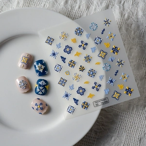 5D Embossed Datura pattern nail stickers with blue and yellow vintage tile designs