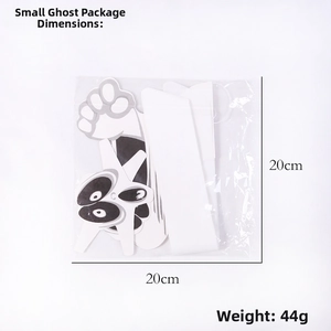 Detail of paper honeycomb ghost decorations in clear packaging for Halloween parties