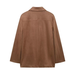 Back view of a brown velvet blazer showing professional tailoring and loose fit design