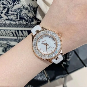 Luxury women's quartz watch with white ceramic strap and sparkling crystal bezel