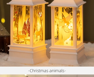 Detail of white Christmas lantern with reindeer silhouettes and warm yellow LED light