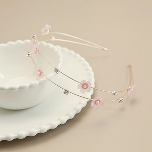 Elegant double-layered gold headband with pink flowers, pearls, and rhinestones