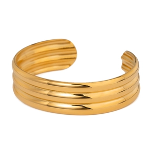 Three-layer 18k gold plated stainless steel cuff bracelet with a polished smooth finish