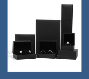 Variety of premium black textured paper jewelry boxes for rings necklaces and pendants