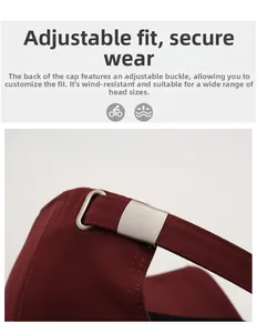 Detail of adjustable matte metal buckle and cotton twill strap on burgundy baseball cap