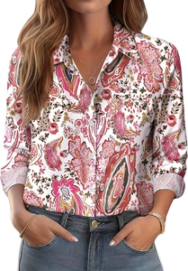 Detail of a white long-sleeved shirt featuring a colorful paisley floral print and collar