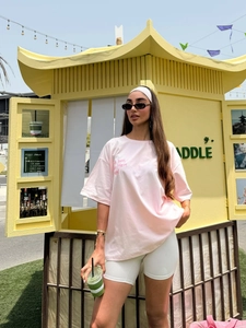 Pink oversized cotton T-shirt with drop shoulder and round neck for summer wear