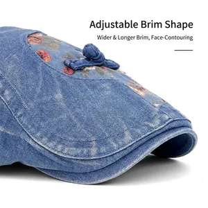 Baskenmütze aus blauem Denim mit Blumenstickerei und klappbarer breiter Krempe für Damen