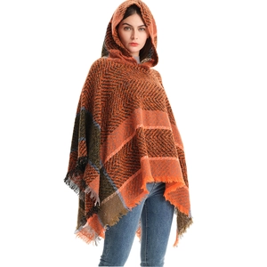 Women's orange herringbone hooded poncho cape with tassel fringe in soft knit fabric