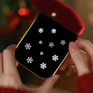 Set of five pairs of S925 silver snowflake stud earrings in a red holiday gift box