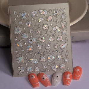 Detail of Co-207 laser holographic nail stickers with 3D floral and butterfly designs