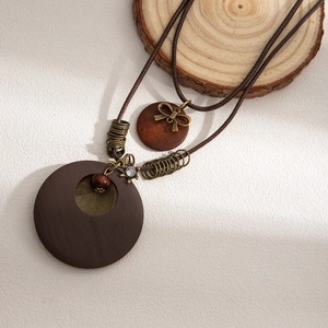 Bohemian double-layer long necklace with brown round wooden pendant and bow accent