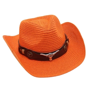 Detail of orange woven cowboy hat featuring a brown leather band and silver bull head badge