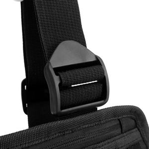 Detail of durable black nylon webbing and tactical plastic buckle on military chest rig