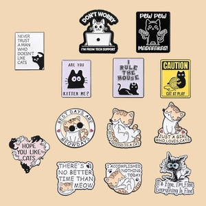 Set of 13 cute cartoon cat enamel pins with funny English quotes on a clean beige background