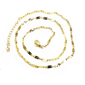 Detailed view of a gold bead chain necklace with lobster clasp and adjustable tail chain