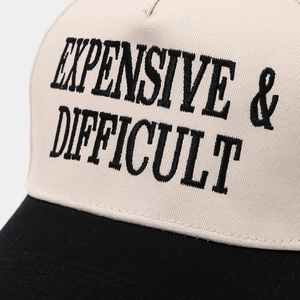 Two-tone baseball cap in beige and black with EXPENSIVE & DIFFICULT 3D embroidery