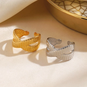 Minimalist geometric crisscross open rings with textured finish in gold and silver colors