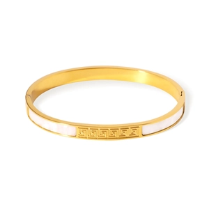 Gold stainless steel bangle with white shell inlays and Greek key pattern on white base