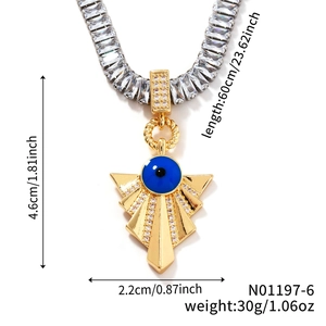 Detail view of gold Evil Eye pendant with size specifications and crystal chain