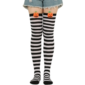 Detail of Halloween over-knee socks with black white stripes and orange pumpkin patch