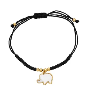 Pulsera tejida negra ajustable con colgante de elefante dorado e incrustación de nácar