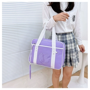 Purple JK uniform heart ita bag with a clear window and white shoulder straps