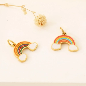 Macro detail of 18K gold rainbow cloud pendants with colorful enamel inlay for jewelry making