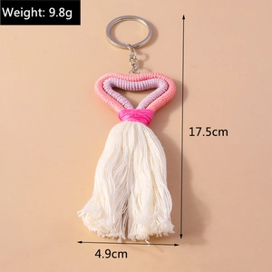 Pink and white knit heart keychain with dimensions 17.5cm length and 9.8g weight