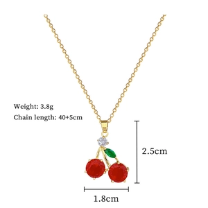 Detail view of crystal cherry necklace with measurements showing 2.5cm pendant size