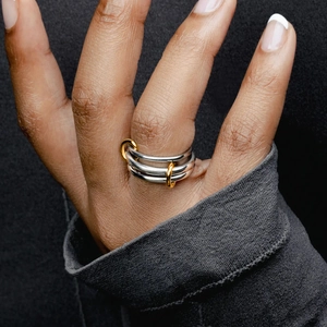 Three-layer interlocking stainless steel ring in gold and silver mixed tones