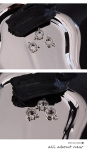 Macro detail of engraved horseshoe lobster clasps for DIY jewelry making in polished silver