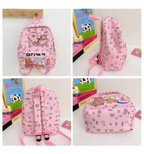 Detail view of pink Capybara toddler backpack showing front, side, and back compartments