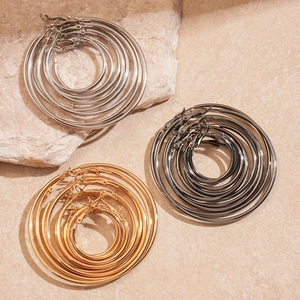 Detailed set of multi-size polished hoop earrings in gold, silver, and gunmetal finishes