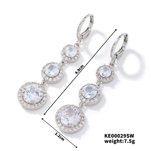 Detail view of silver drop earrings with white zircons showing 4.9cm by 1.2cm dimensions